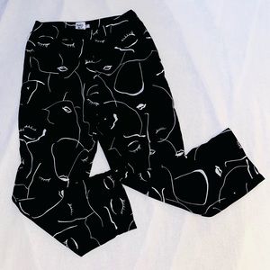 Princess Polly abstract face trousers